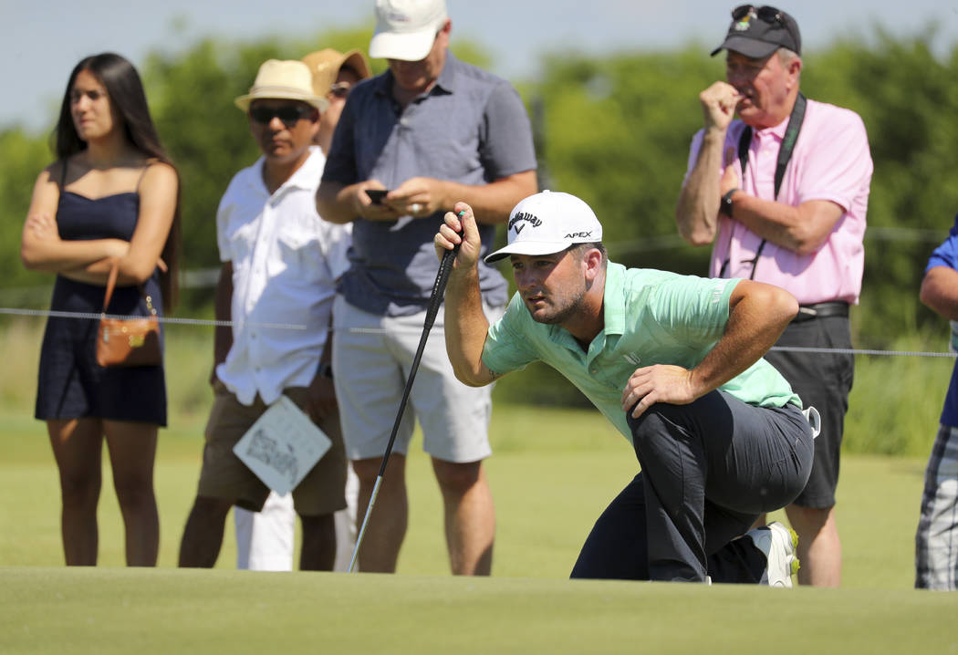 Matt Every lines up a putt on the 10th green in the final round of the Byron Nelson golf tourna ...