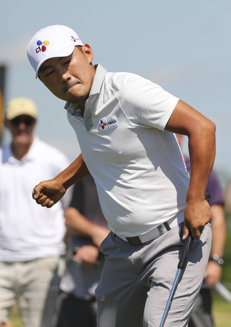 Sung Kang pumps his fist after a birdie putt on the 10th hole in the final round of the Byron N ...