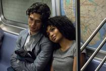 Charles Melton, left, and Yara Shahidi appear in a scene from the film “The Sun Is Also a Sta ...
