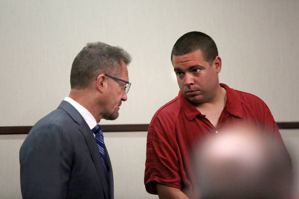Matthew James Terry, right, a Las Vegas police officer arrested on suspicion of lewdness with a ...
