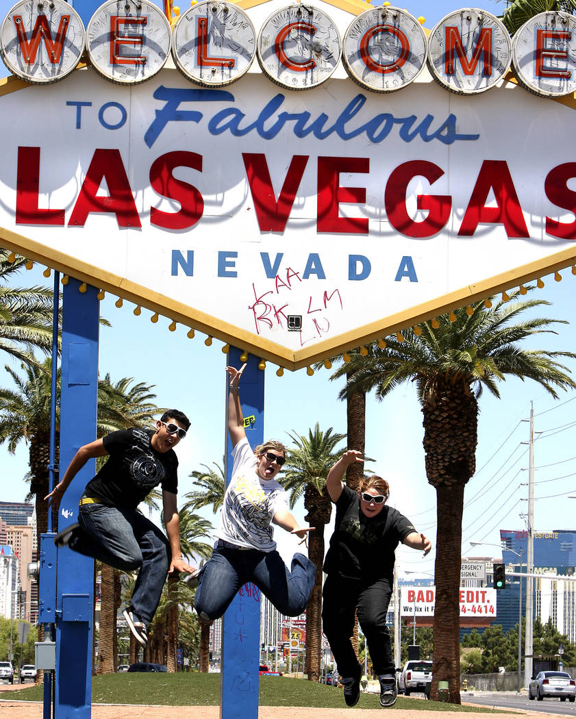 Tourists from Arizona, from left, Joseph Harris, Laura Massengale and Emily Viramontes, all age ...