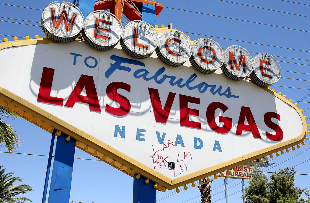 Graffiti blemishes the "Welcome To Fabulous Las Vegas Nevada" sign on Las Vegas Boulevard Monda ...