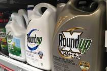 FILE - In this Feb. 24, 2019, file photo, containers of Roundup are displayed on a store shelf ...