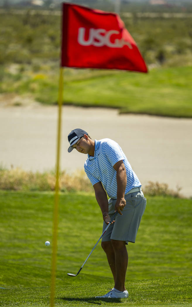 Golfer Shane Crampton chips a ball towards the stick during a PGA US Open qualifying round at t ...