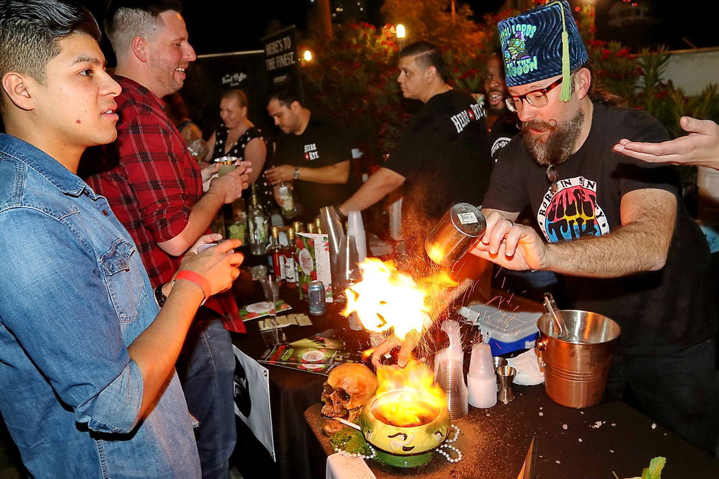 Adam Rains creates a cocktail at Vegas Unstripped 2019. (Hew Burney)