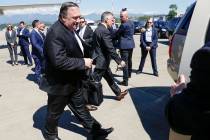U.S. Secretary of State Mike Pompeo walks from the plane upon his arrival at the airport in the ...
