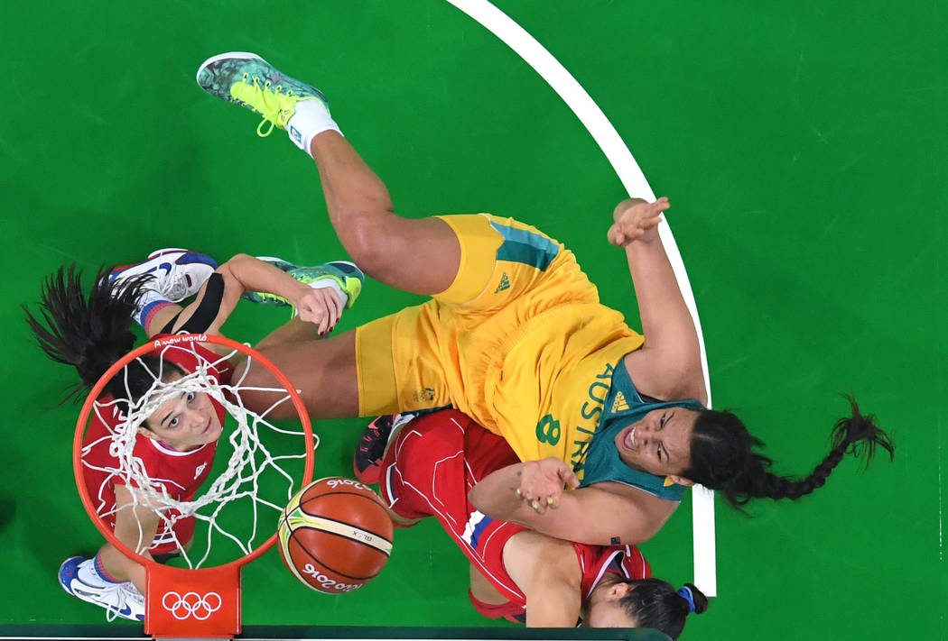 Australia's Elizabeth Cambage (8) shoots against Serbia during a women's basketball game at the ...