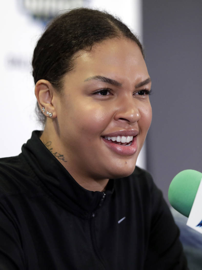 Dallas Wings newly acquired center Liz Cambage of Australia, responds to questions during a new ...