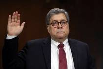 Attorney General William Barr is sworn in to testify before the Senate Judiciary Committee hear ...