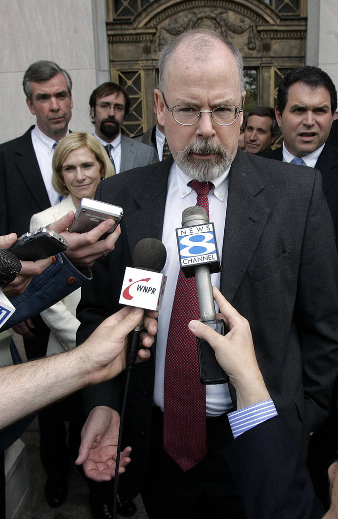 FILE - In this April 25, 2006, file photo, John Durham speaks to reporters on the steps of U.S. ...