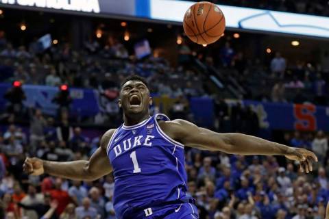 Duke's Zion Williamson (1) reacts after a dunk against North Carolina during the second half of ...
