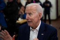 Former vice president and Democratic presidential candidate Joe Biden jokingly reacts to a comm ...