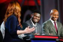 Duke's Zion Williamson second from right, is interviewed by an ESPN reporter during the NBA bas ...
