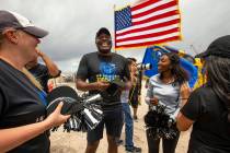 Terrence Thornton receives a new Raiders hat at the Las Vegas Stadium site during the Southern ...