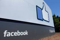 A 2013 file photo shows a sign at Facebook headquarters in Menlo Park, Calif. Facebook said Thu ...