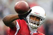 In this Sunday, Jan. 1, 2012 file photo, Arizona Cardinals' Patrick Peterson warms up prior to ...