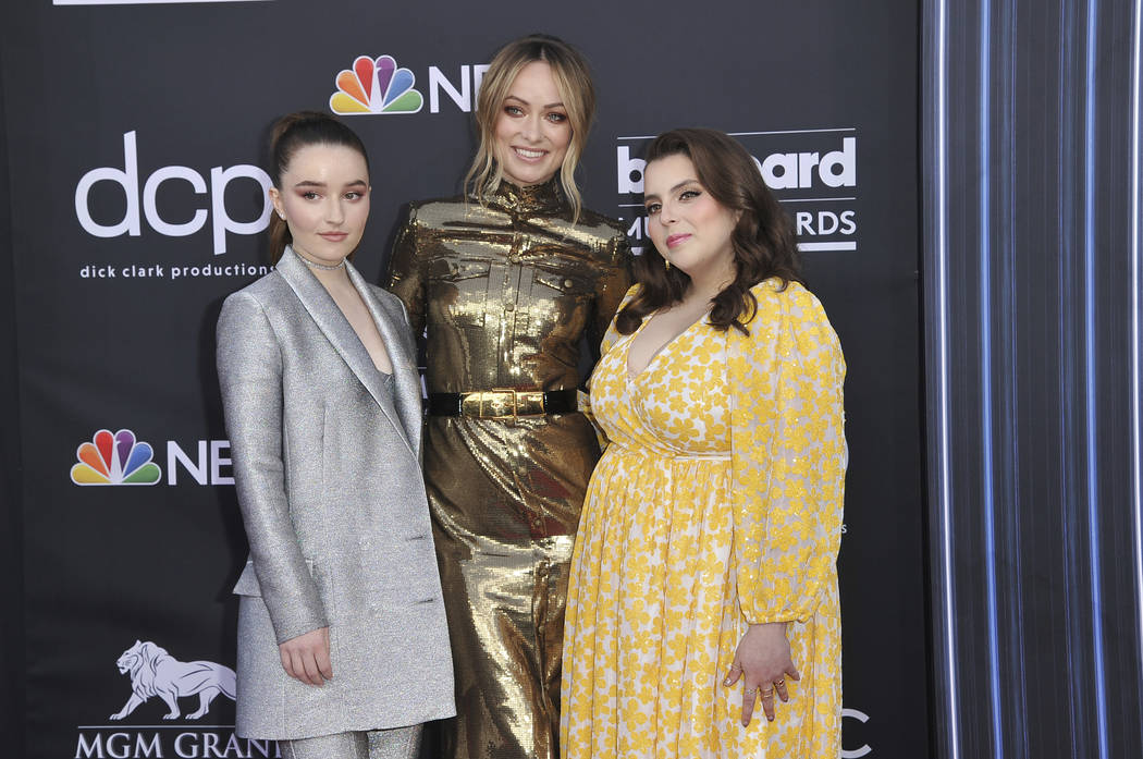 Kaitlyn Dever, left, Olivia Wilde, Beanie Feldstein arrive at the Billboard Music Awards on May ...