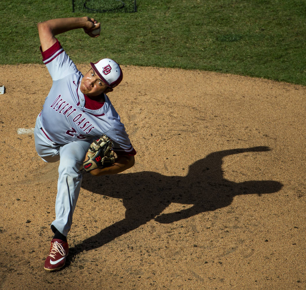 Desert Oasis pitcher Aaron Roberts (25) winds up for another throw versus Reno in the second in ...