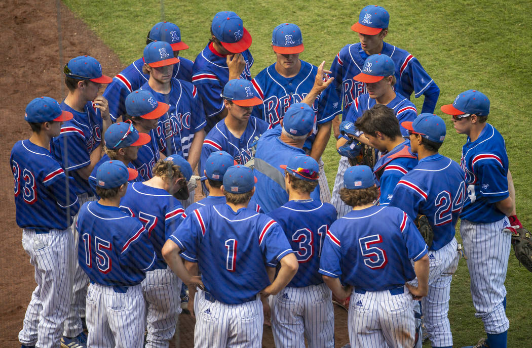 Reno head coach Pete Savage brings his team together for a talk versus Desert Oasis in the seco ...