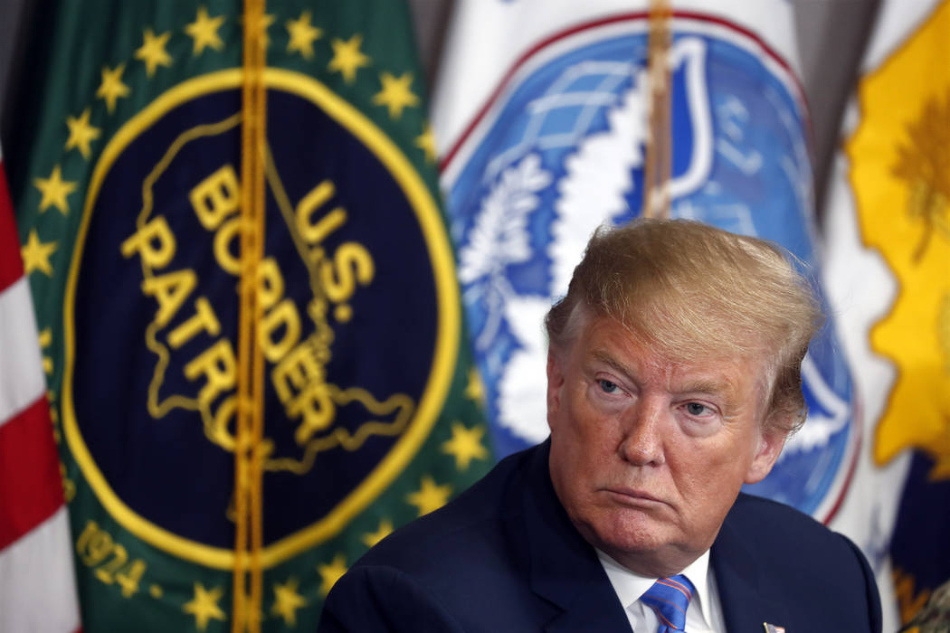 FILE - In this April 5, 2019 file photo, President Donald Trump participates in a roundtable on ...