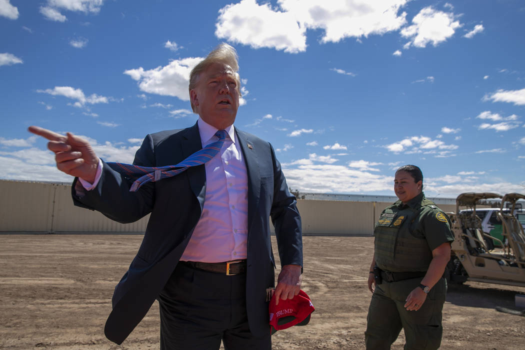 President Donald Trump speaks April 5, 2019, as he visits a new section of the border wall with ...