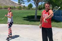 Harlie Peterson, left, and Austin Peterson, practice a routine at Lone Mountain Park on May 13. ...