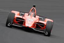 Marco Andretti drives through turn one during practice for the Indianapolis 500 IndyCar auto ra ...