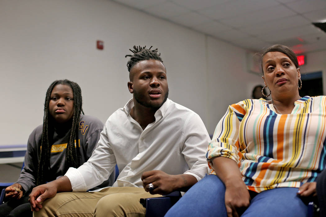 Bryan LaGrange speaks to the Review-Journal next to his sister Loren Sampey, 16, left, and his ...