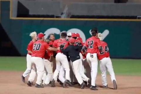 A screenshot from a YouTube video shows Las Vegas High baseball players celebrating their 5-4 w ...