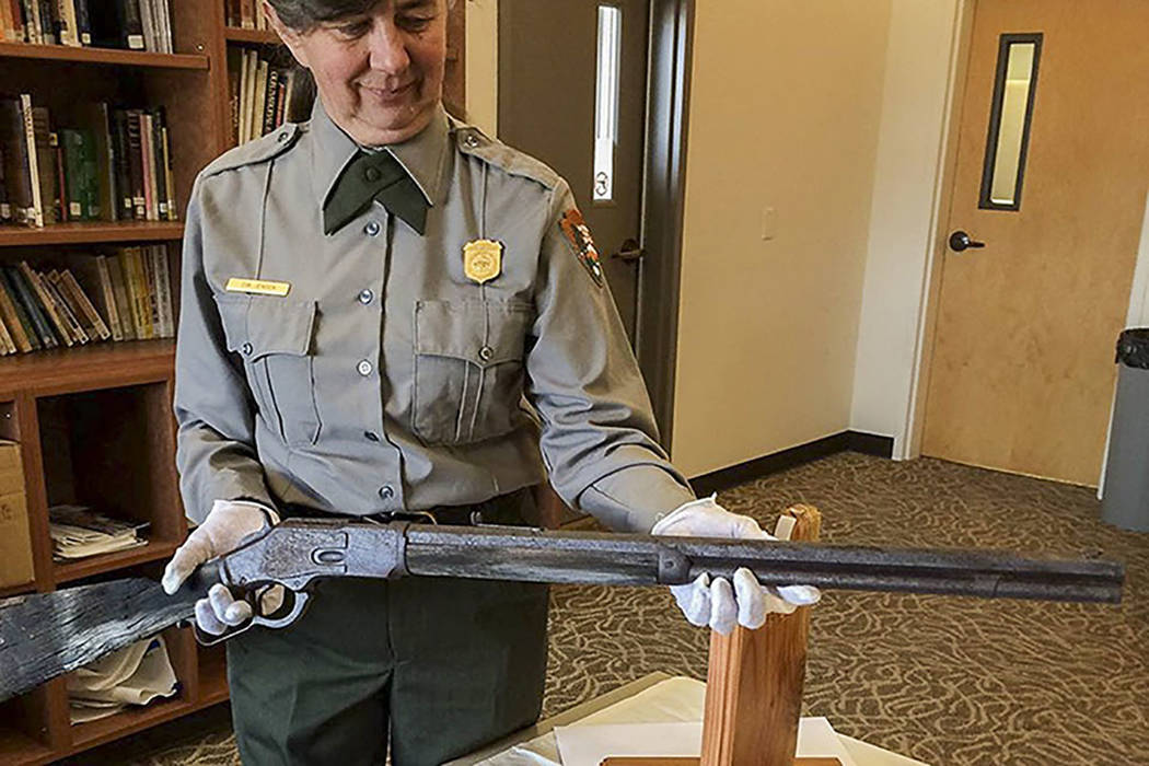 Eva Jensen holds a 19th-century Winchester rifle found leaning against a tree in Great Basin Na ...