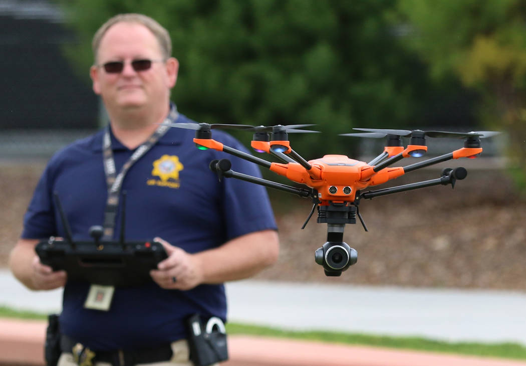 Dave Martel, Metro’s small unmanned aerial system program manager, flies his drone over Craig ...