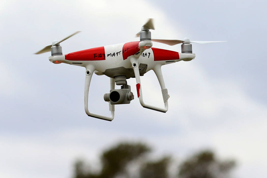 The Phantom IV drone flies over Craig Ranch Park on Friday, May 17, 2019, as drone pilots pract ...