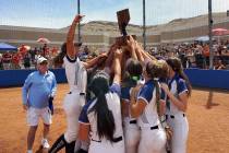 Shadow Ridge softball players hoist the Class 4A state championship trophy after winning their ...