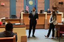 Julio Garcia, left, and Jen Smith, both graduating students at Boyd Law School at UNLV, speak ...