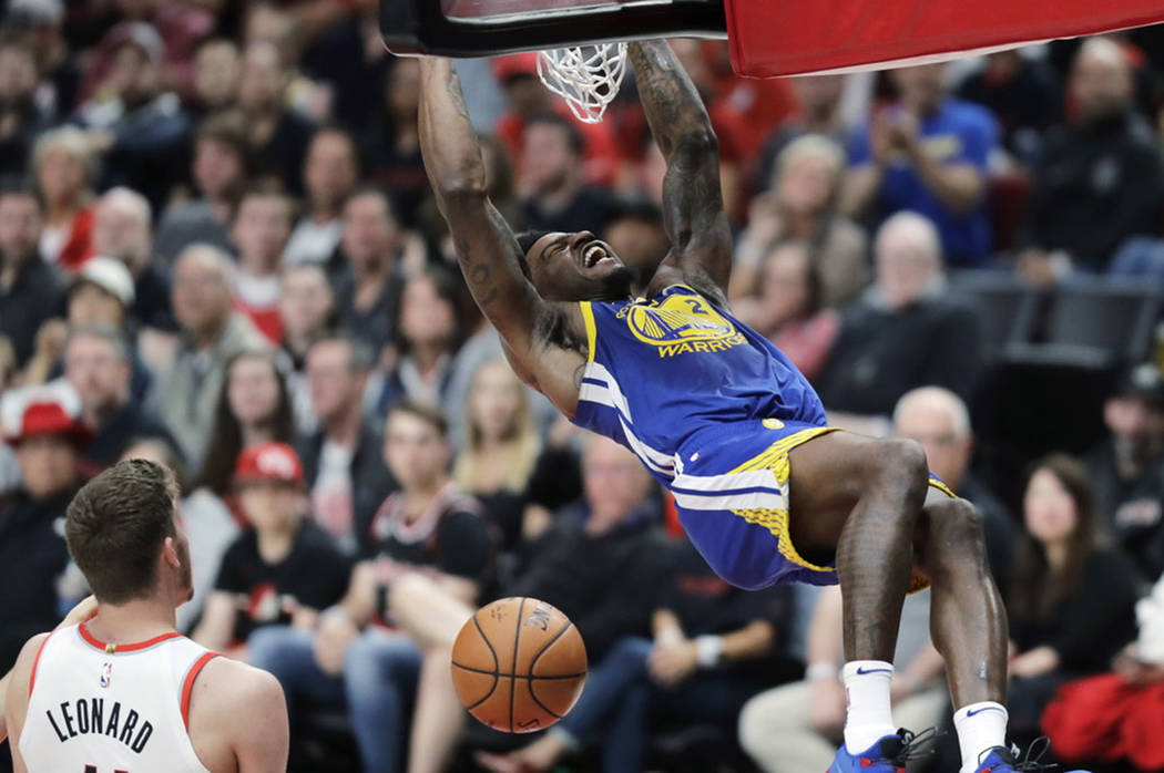 Golden State Warriors forward Jordan Bell dunks during the second half of Game 3 of the team's ...
