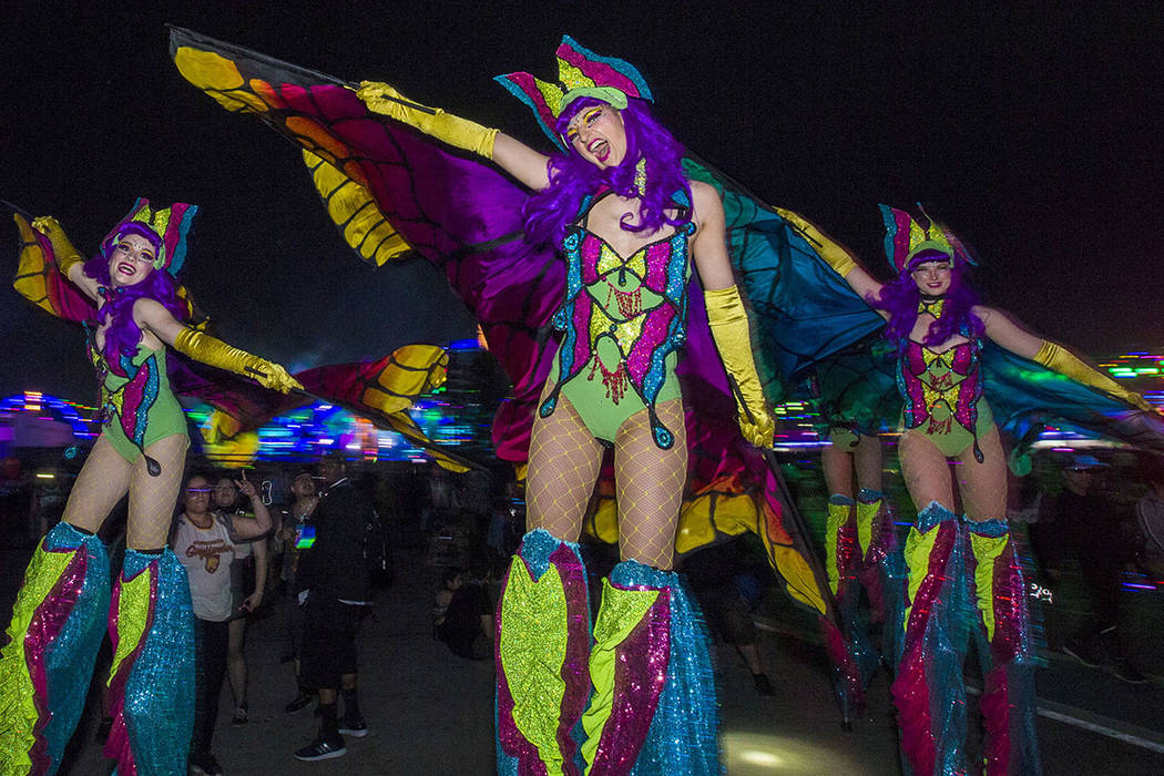 Electric Ladyland Stilt Walkers make their way down Rainbow Road during day two of Electric Dai ...