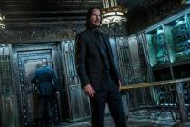 This image released by Lionsgate shows Keanu Reeves in a scene from "John Wick: Chapter 3 ...