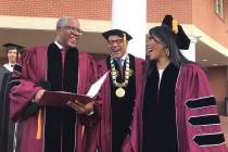 Robert F. Smith, left, laughs with David Thomas, center, and actress Angela Bassett at Morehous ...