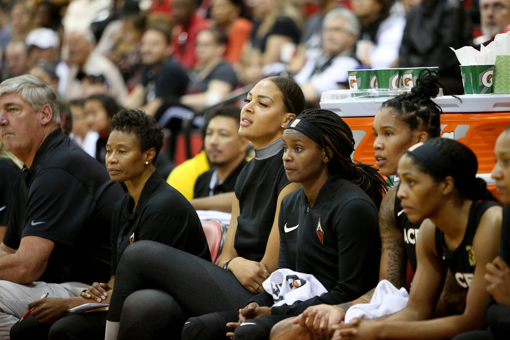 Liz Cambage, who was recently traded to the Aces from the Dallas Wings, watches the preseason g ...