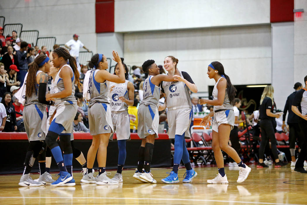 Minnesota Lynx react after a basket against the Las Vegas Aces during a preseason game at Cox P ...