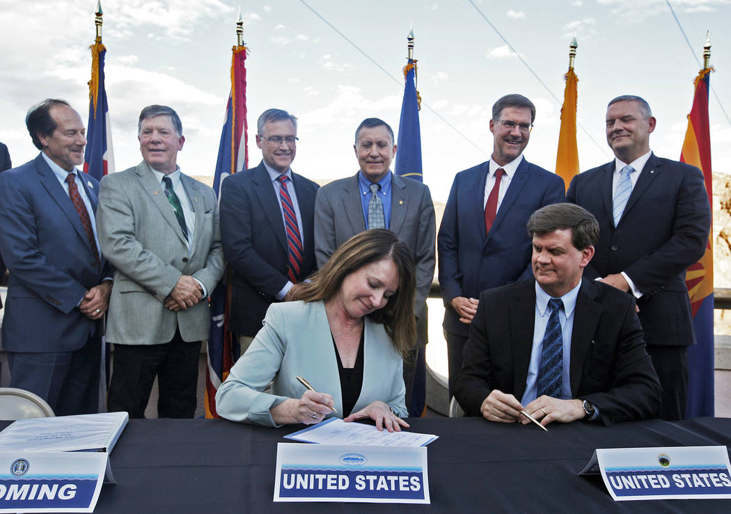Commissioner of the U.S. Bureau of Reclamation Brenda Burman signs the interstate drought conti ...