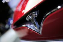 A Sept. 30, 2016, file photo shows the logo of the Tesla model S at the Paris Auto Show in Pari ...