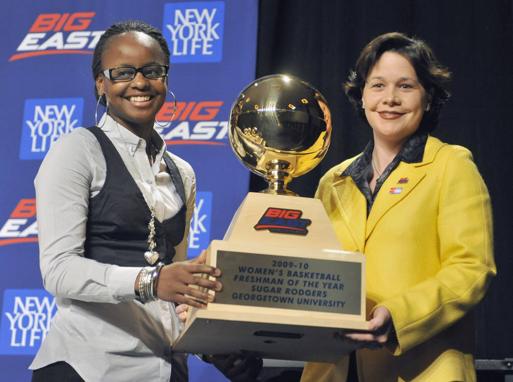 Georgetown's Sugar Rodgers, left, accepts the Big East women's basketball Freshman of the Year ...