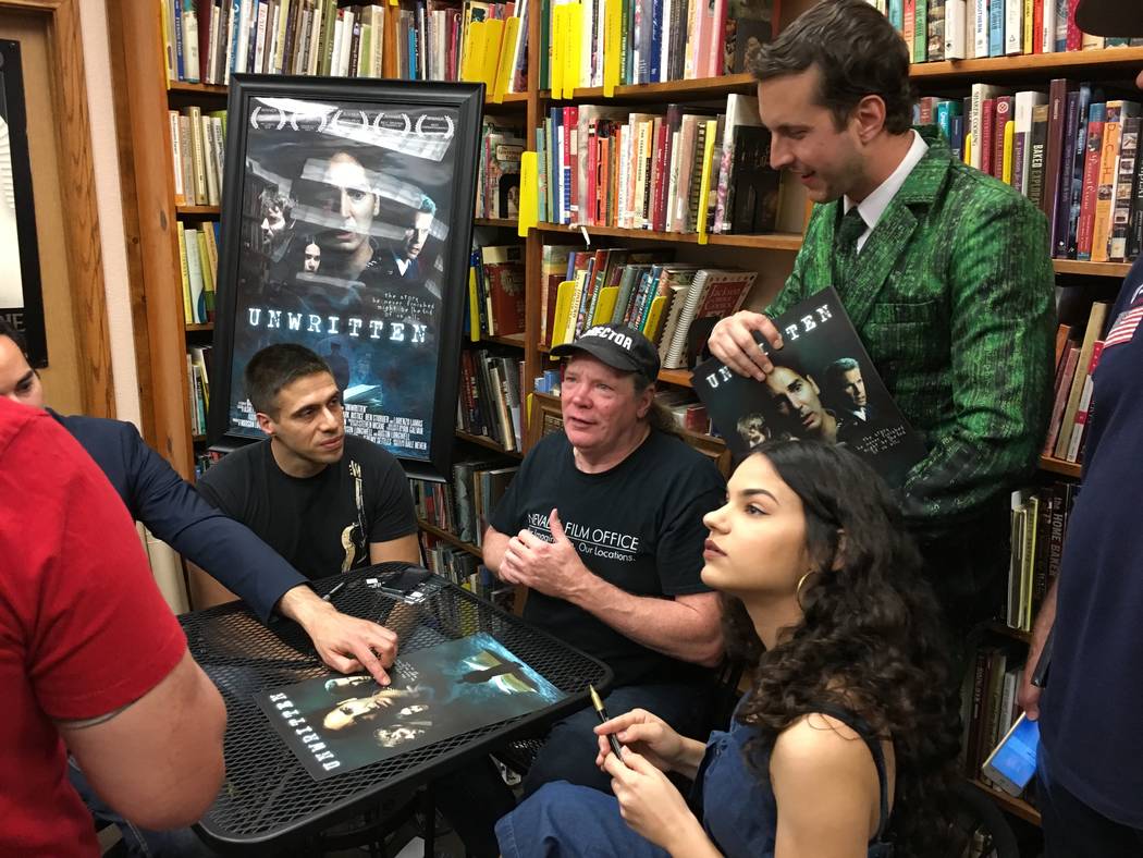 Meeting "Unwritten" fans are composer Ricardo Gerhard, seated left and director Dale Neven and ...