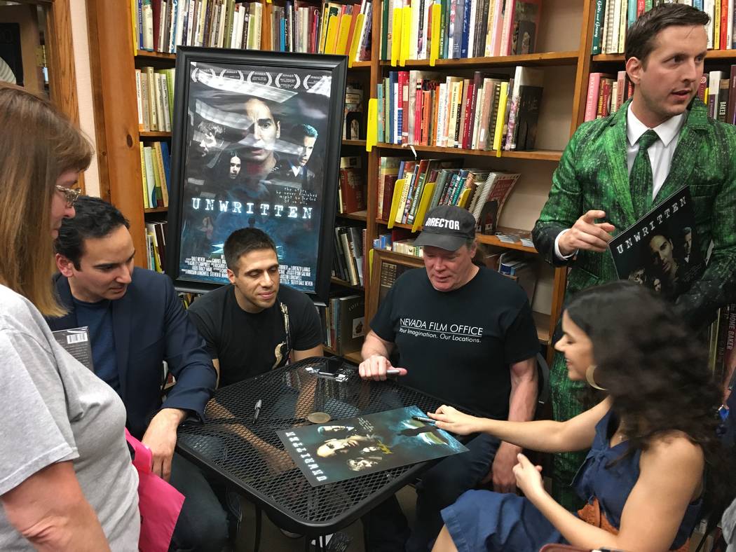 Meeting "Unwritten" fans are actor Gabriel Burrafato, seated far left, composer Ricardo Gerhard ...