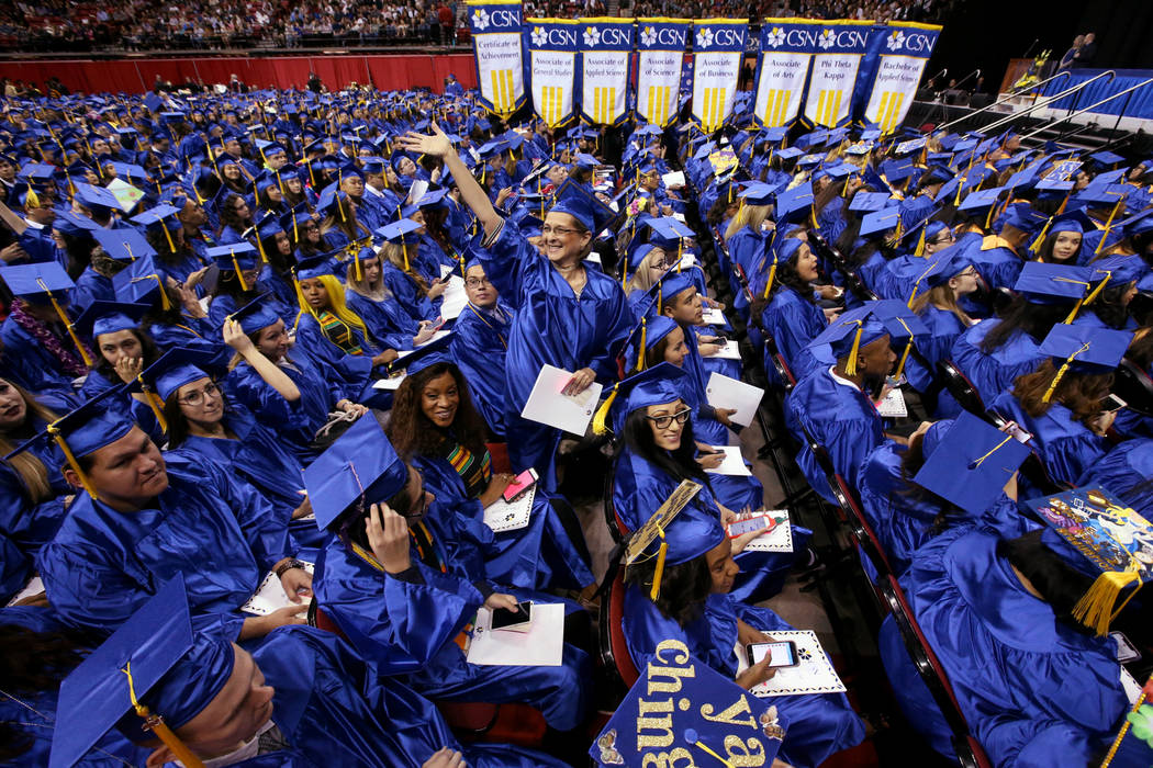 Veronica Gonzales waves to her family during College of Southern Nevada commencement ceremony a ...