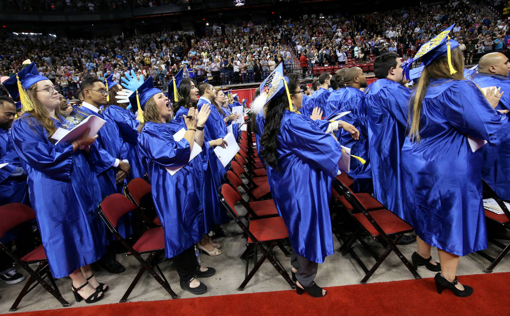 Graduates applaud during College of Southern Nevada commencement ceremony at Thomas & Mack ...