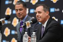 Los Angeles Lakers NBA basketball team general manager Rob Pelinka, left, introduces Frank Voge ...