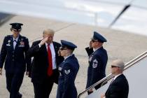 President Donald Trump boards Air Force One for a trip to a Montoursville, Pa., for a campaign ...