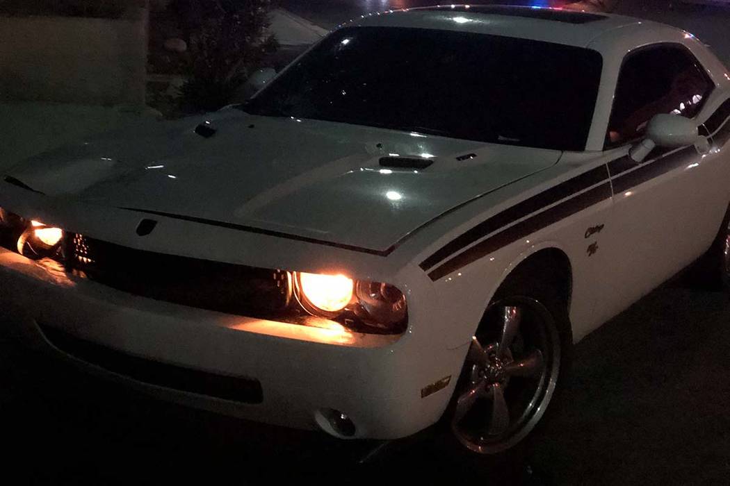 A white Dodge Challenger driven by an off-duty Metropolitan Police Department officer was invol ...